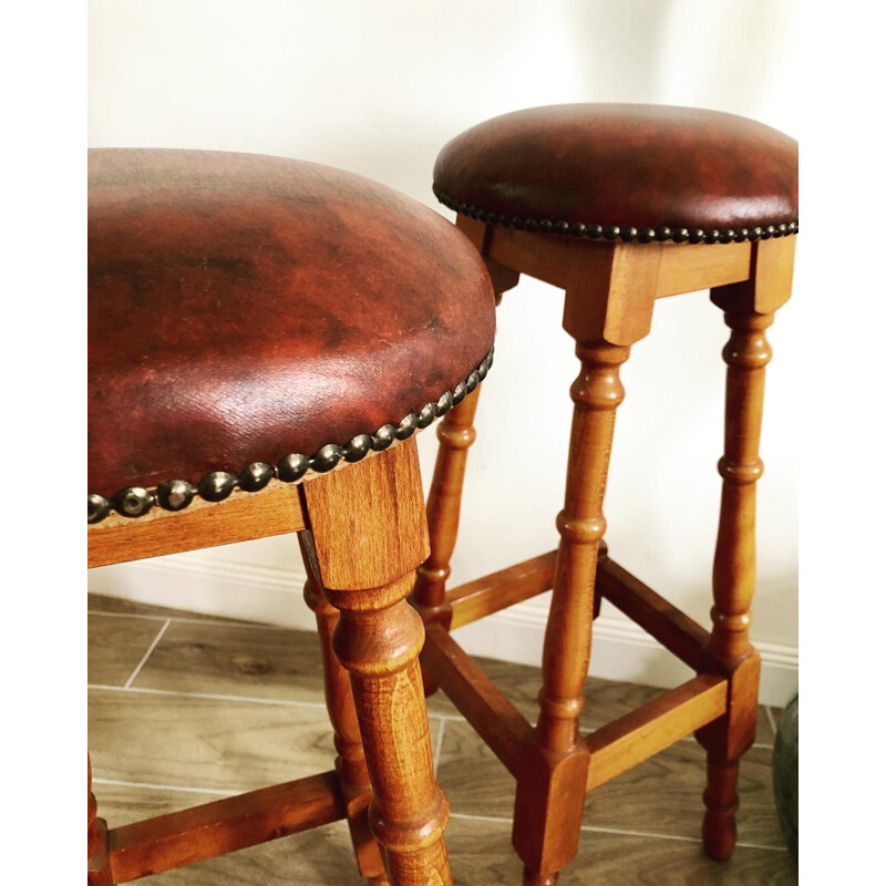 Pair of vintage wood and leatherette bar stools