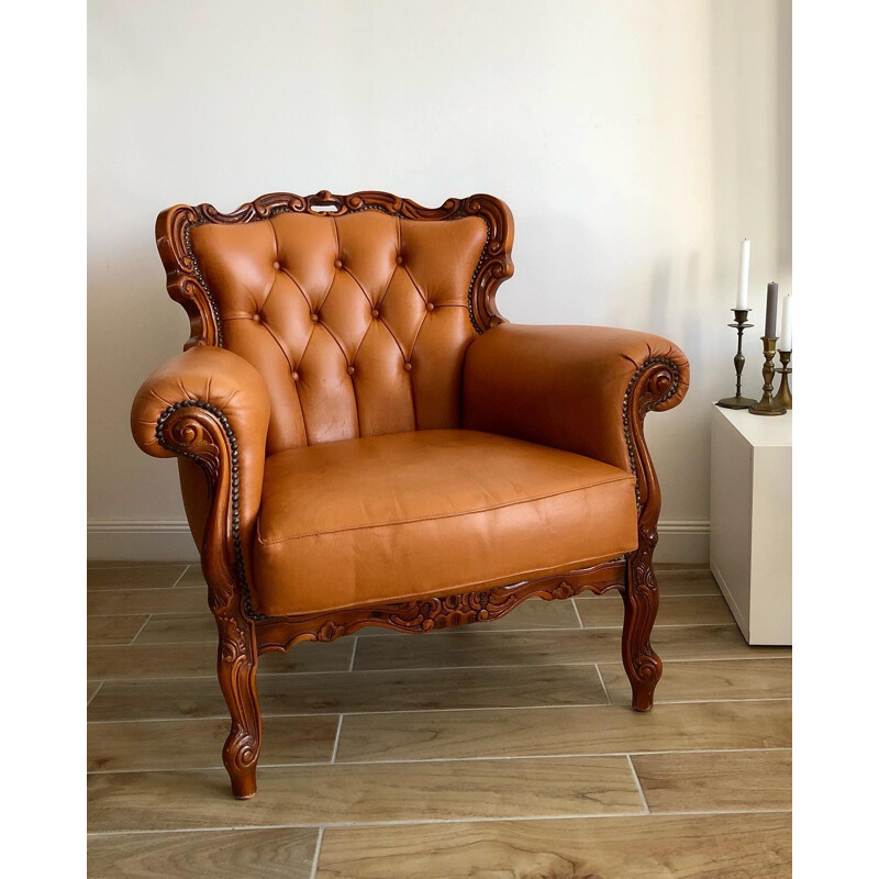Vintage Chesterfield armchair in leather and carved wood
