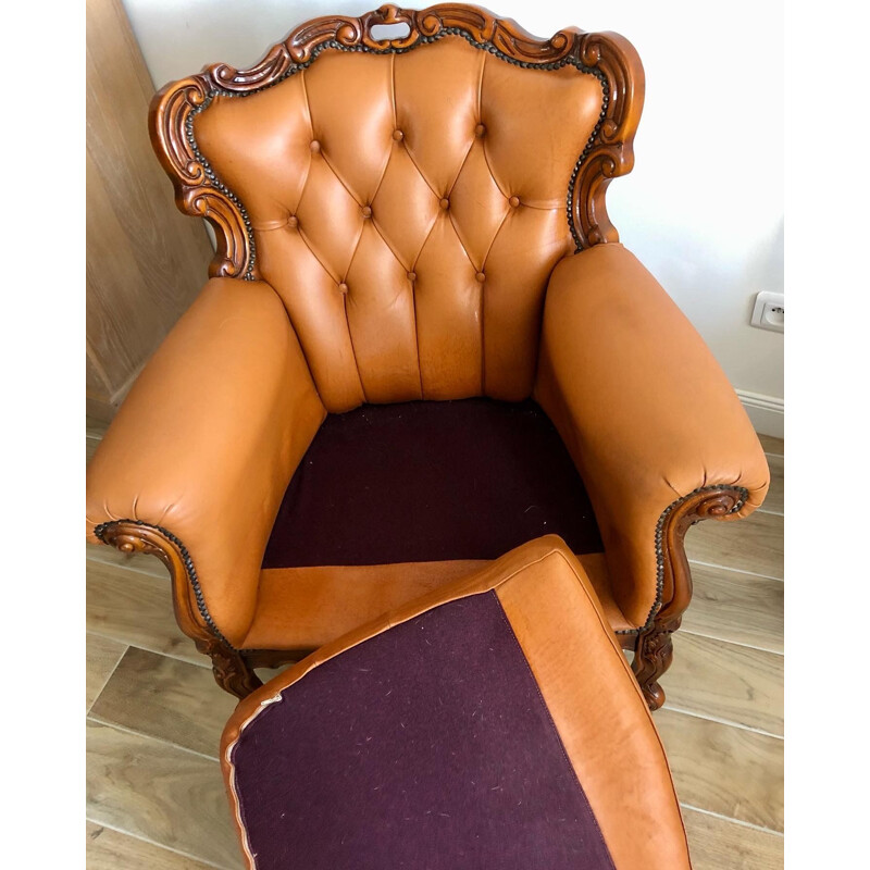 Vintage Chesterfield armchair in leather and carved wood