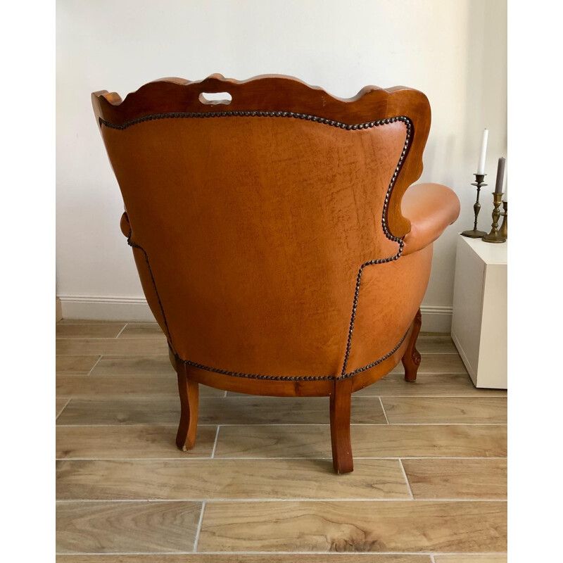 Vintage Chesterfield armchair in leather and carved wood