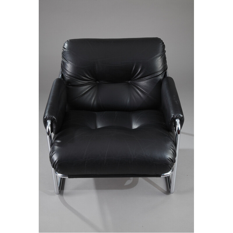 Black leather and metal armchair with ottomane - 1970s