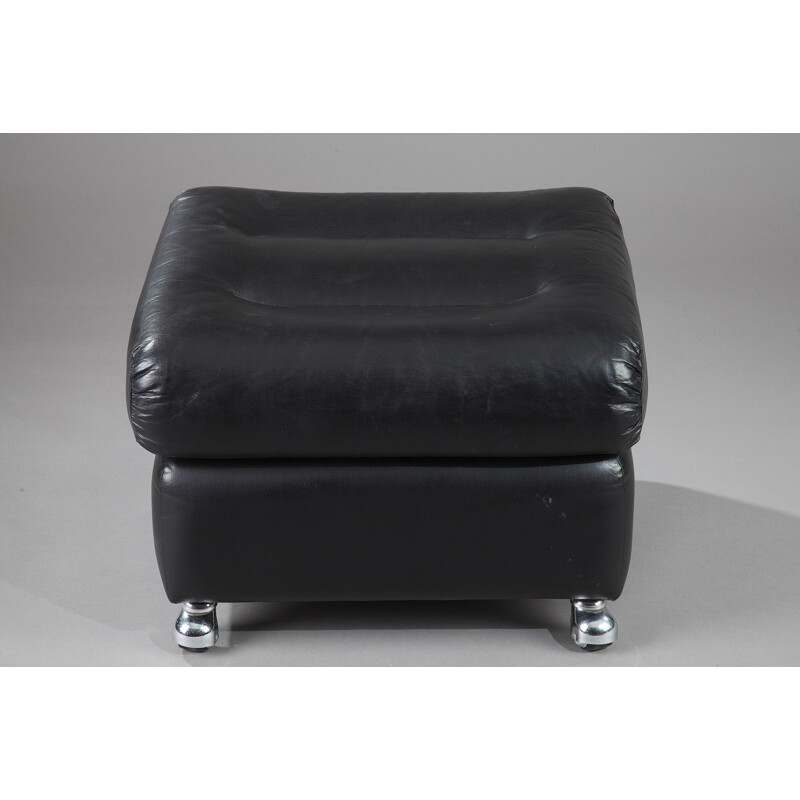 Black leather and metal armchair with ottomane - 1970s