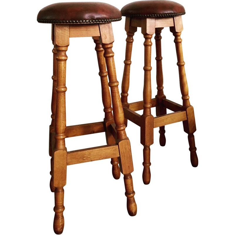 Pair of vintage wood and leatherette bar stools