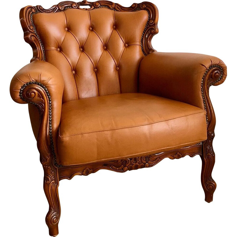 Poltrona Chesterfield d'epoca in pelle e legno intagliato