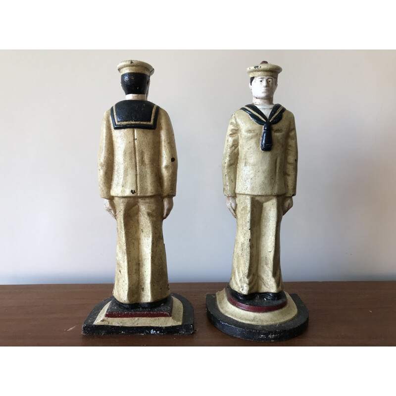 Pair of vintage bookends representing American sailors in cast iron, 1950