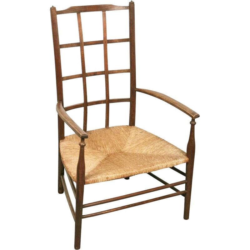 Vintage Arts & Crafts Lattice armchair with rush seat by Liberty & Co