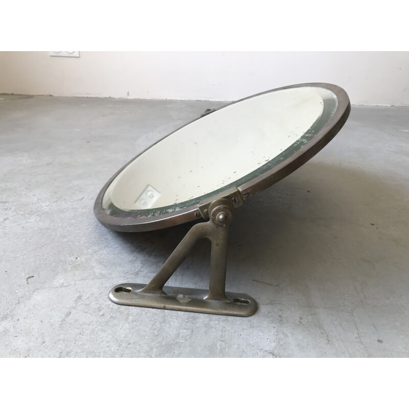 Vintage oval pivoting wall mirror, 1940