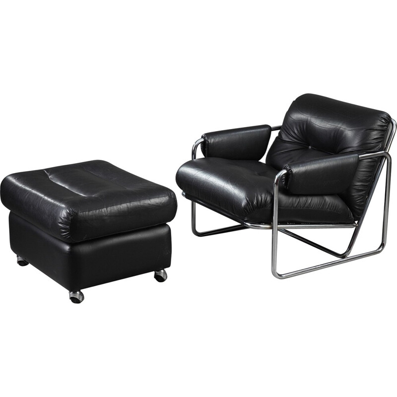Black leather and metal armchair with ottomane - 1970s