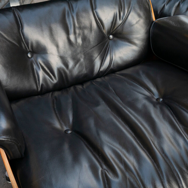 Poltrona vintage "Chair Noir" con pouf di Charles