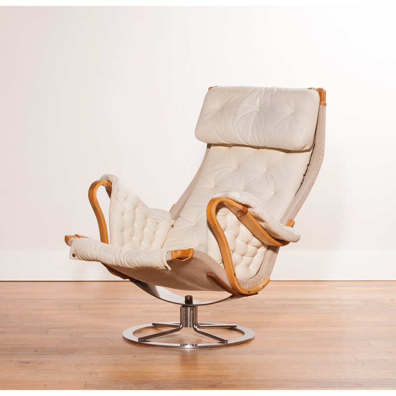 Mid-century lounge chair in leather and chromed metal - 1960s