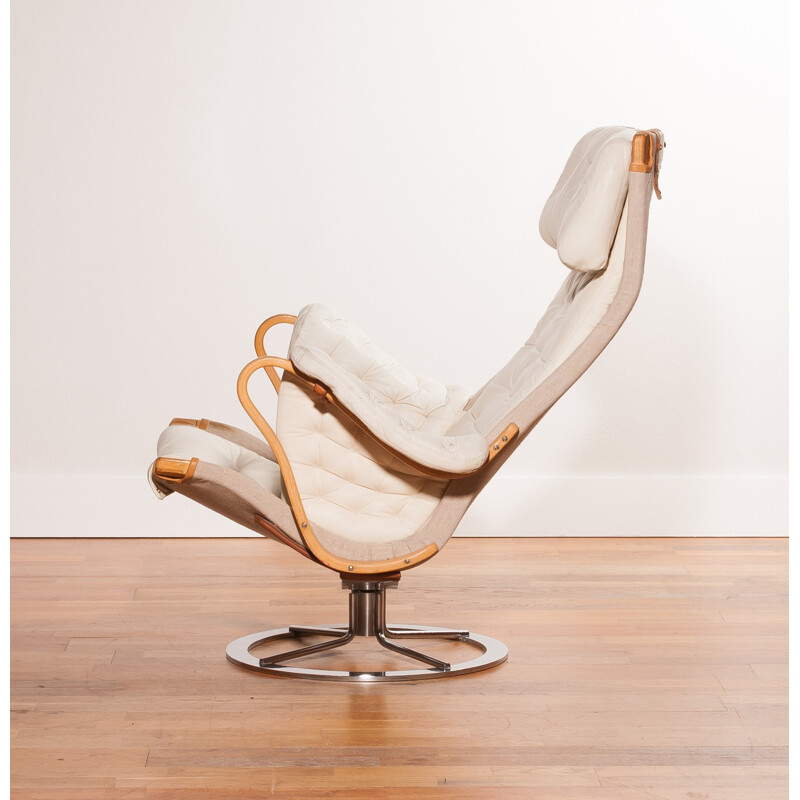 Mid-century lounge chair in leather and chromed metal - 1960s