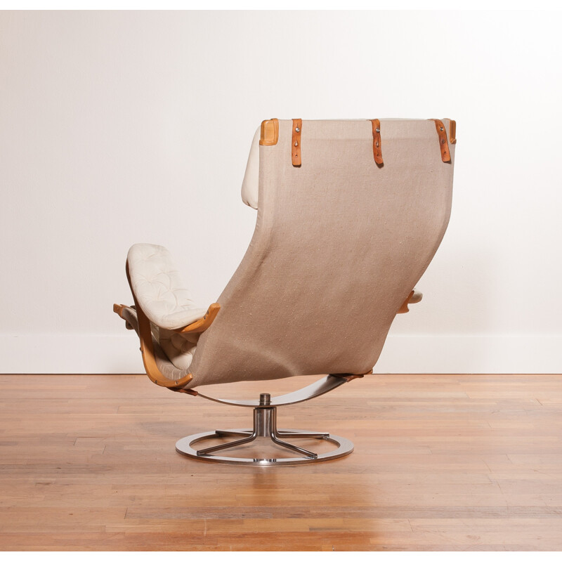 Mid-century lounge chair in leather and chromed metal - 1960s