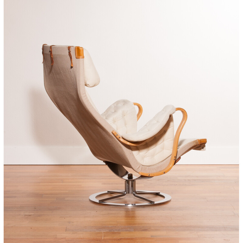 Mid-century lounge chair in leather and chromed metal - 1960s
