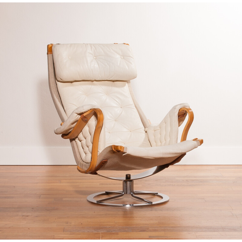 Mid-century lounge chair in leather and chromed metal - 1960s