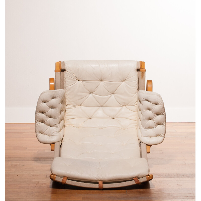 Mid-century lounge chair in leather and chromed metal - 1960s