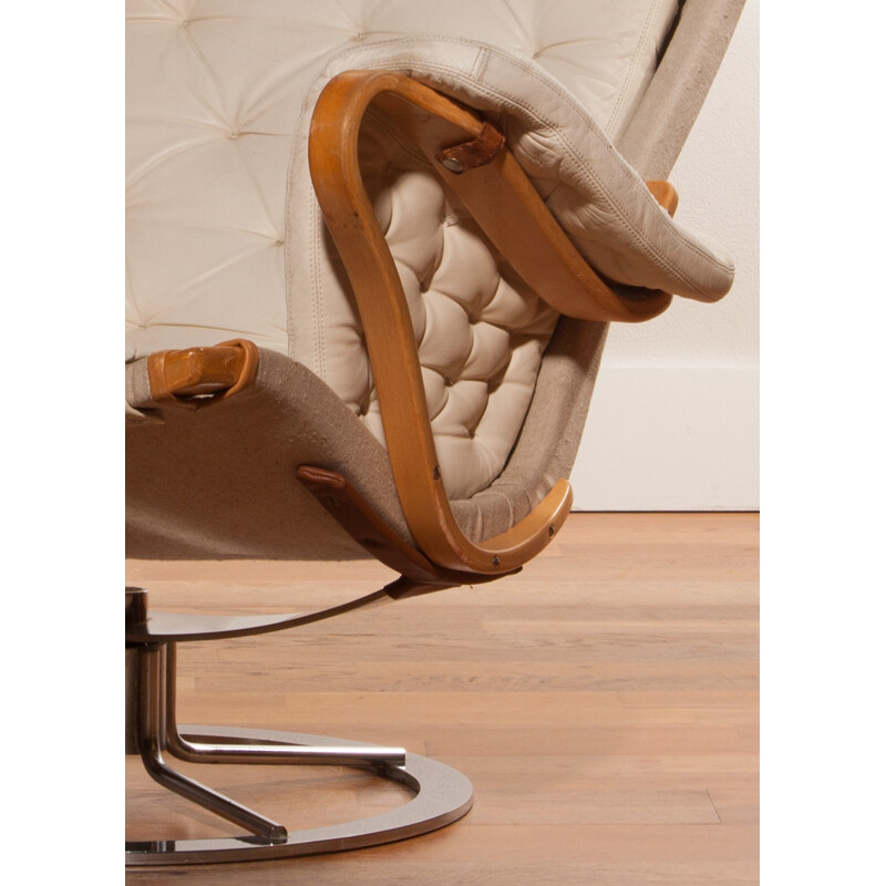 Mid-century lounge chair in leather and chromed metal - 1960s