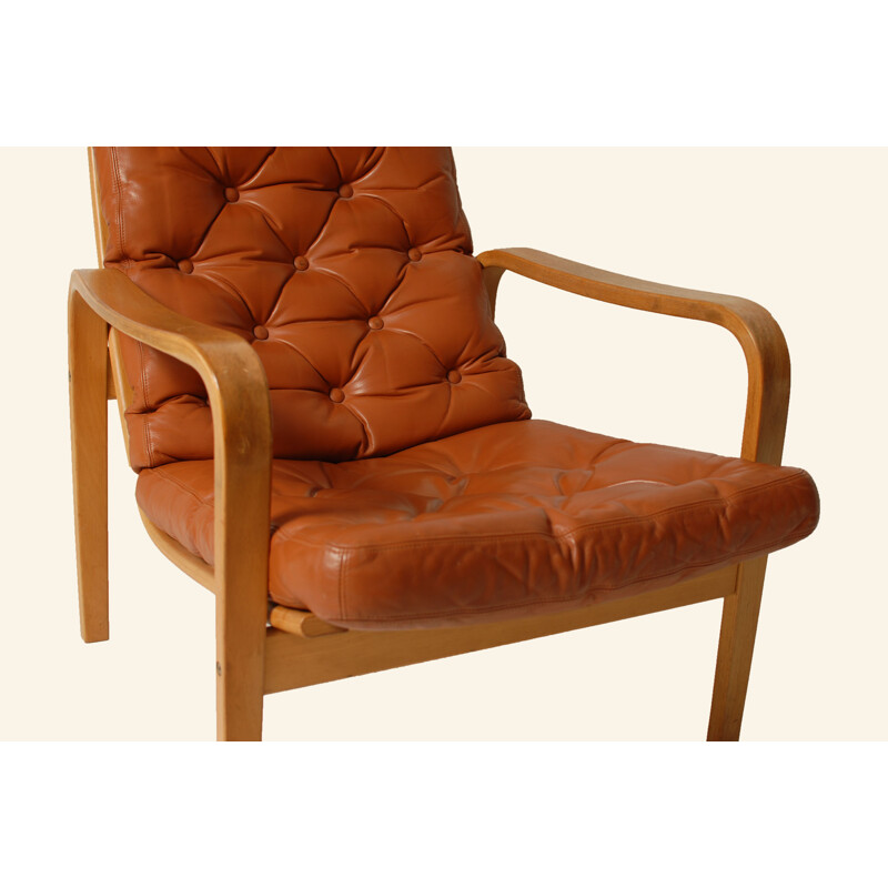 Mid-century armchair in brown leather - 1970s