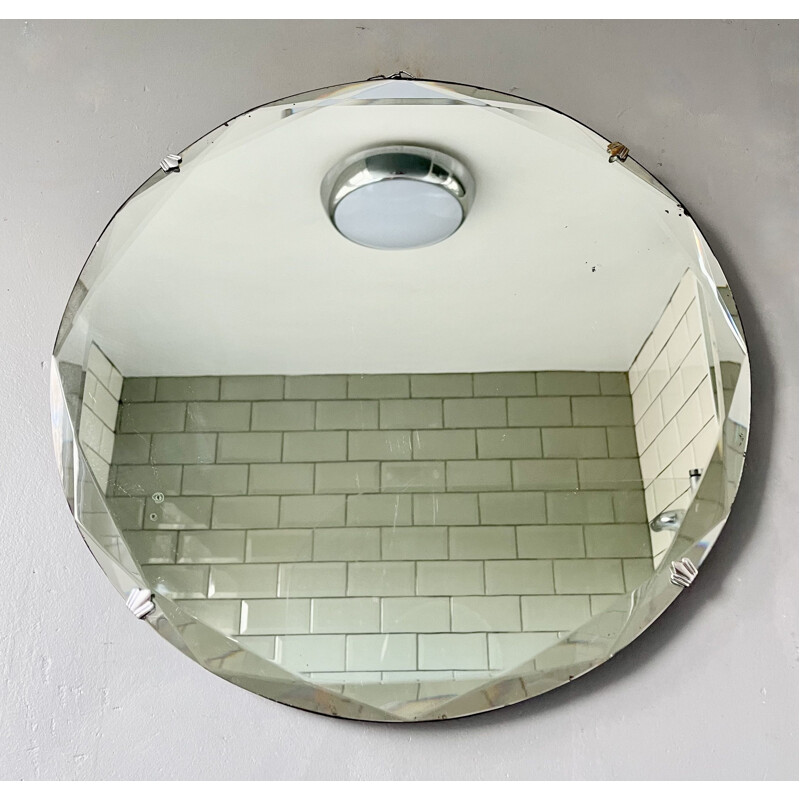 Vintage round mirror with bevelled edge