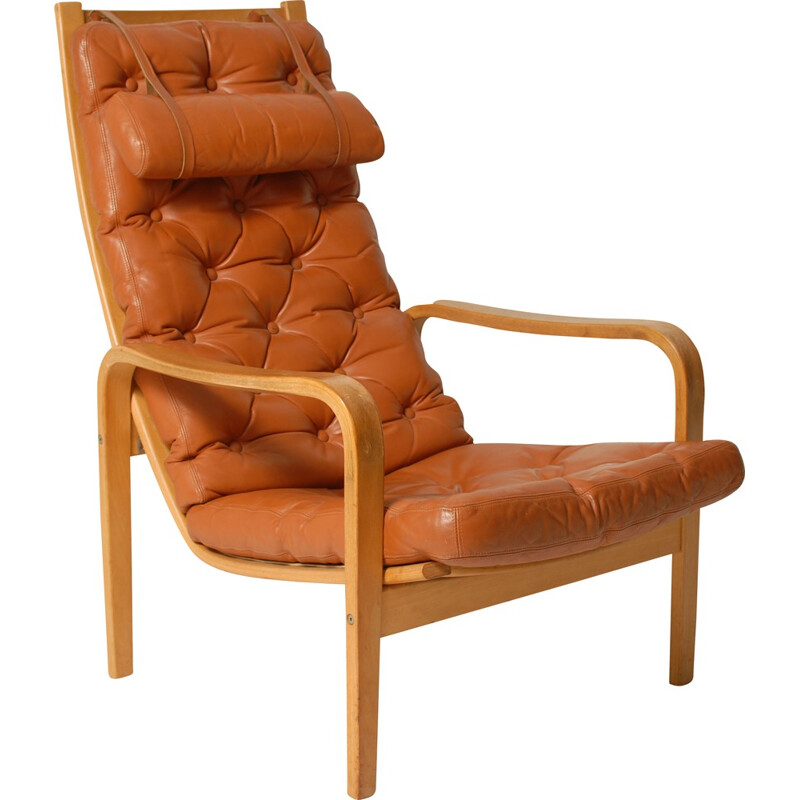 Mid-century armchair in brown leather - 1970s