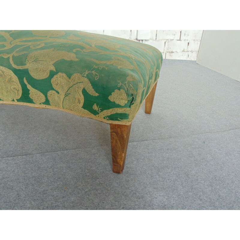 Vintage daybed in green and gold fabric and straw tapestry