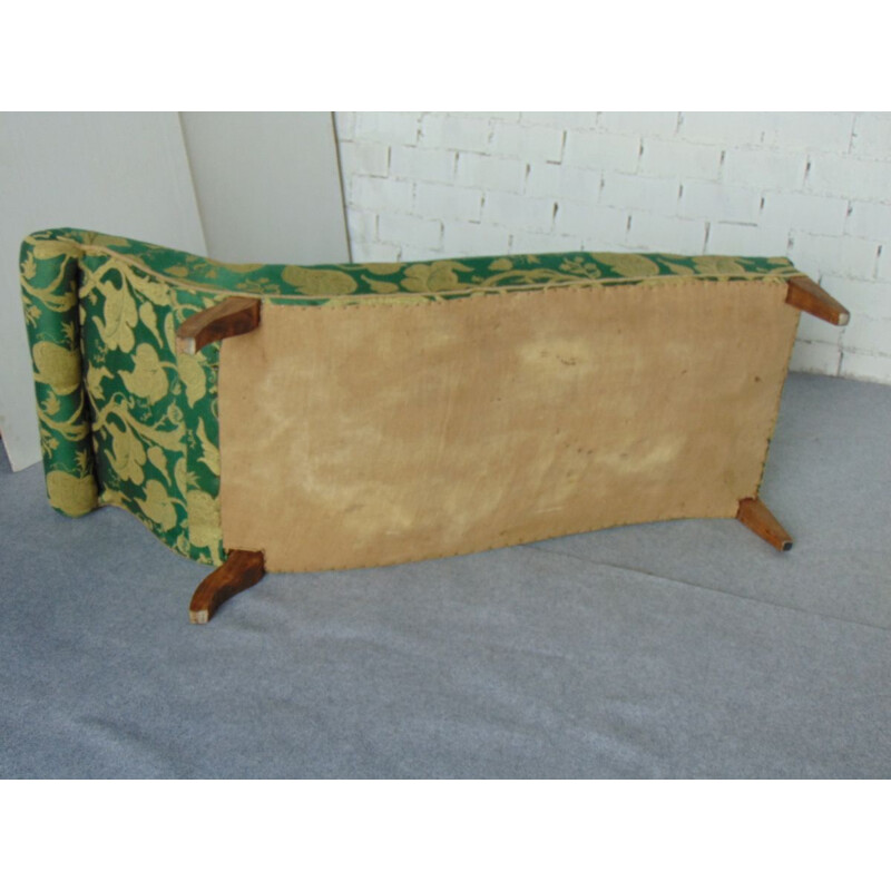 Vintage daybed in green and gold fabric and straw tapestry