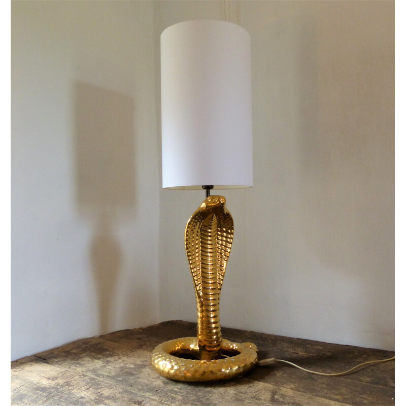 Vintage cobra lamp in gold ceramic and white fabric by Tommaso Barbi, 1970