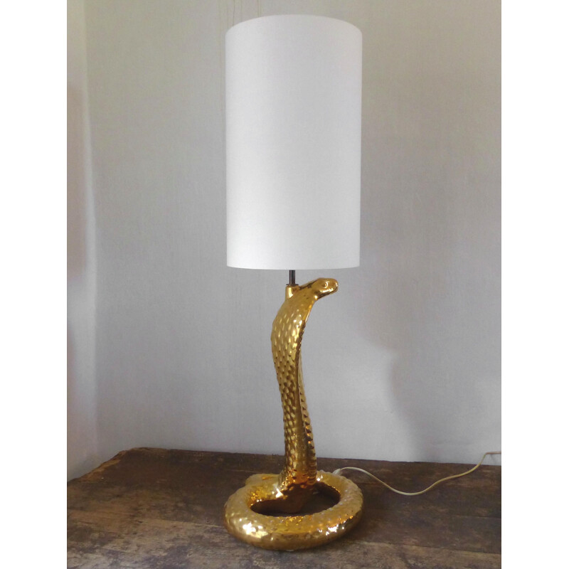 Vintage cobra lamp in goud keramiek en witte stof door Tommaso Barbi, 1970