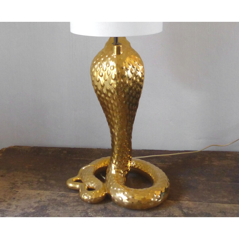 Vintage cobra lamp in gold ceramic and white fabric by Tommaso Barbi, 1970