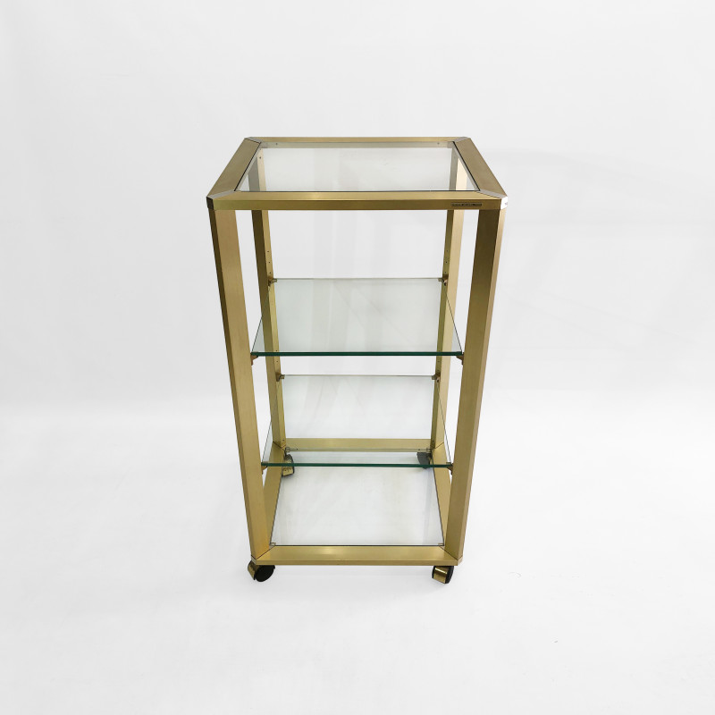 Vintage Hollywood Regency gold shelving on wheels by Pierre Vandel, 1970s