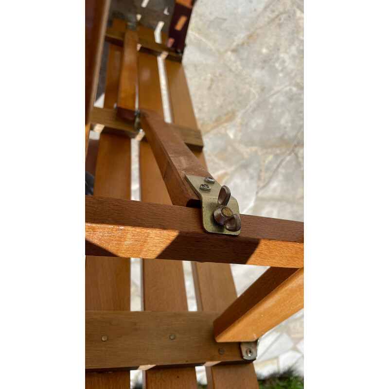 Vintage folding bench in varnished wood