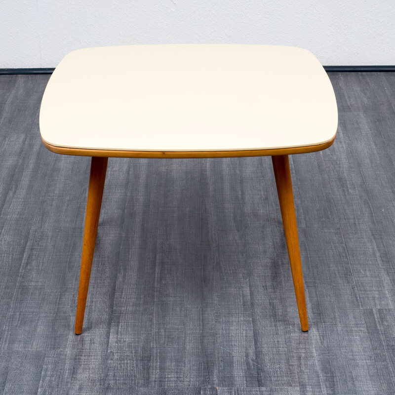 Table basse avec dessus en verre blanc crème - 1960