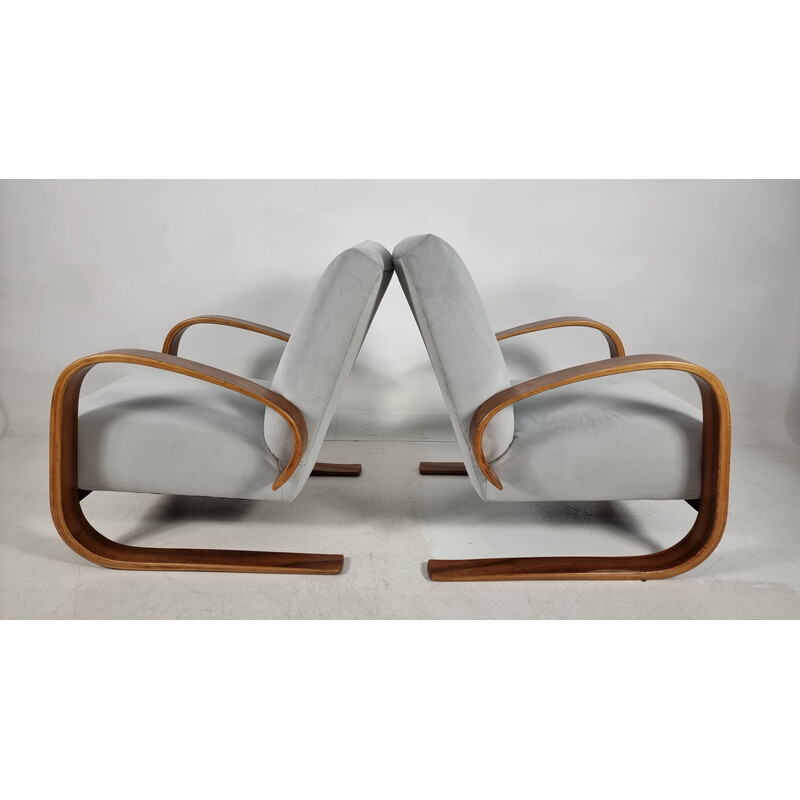Pair of vintage armchairs in walnut by Miroslav Navratil for Up Zavody, 1940s