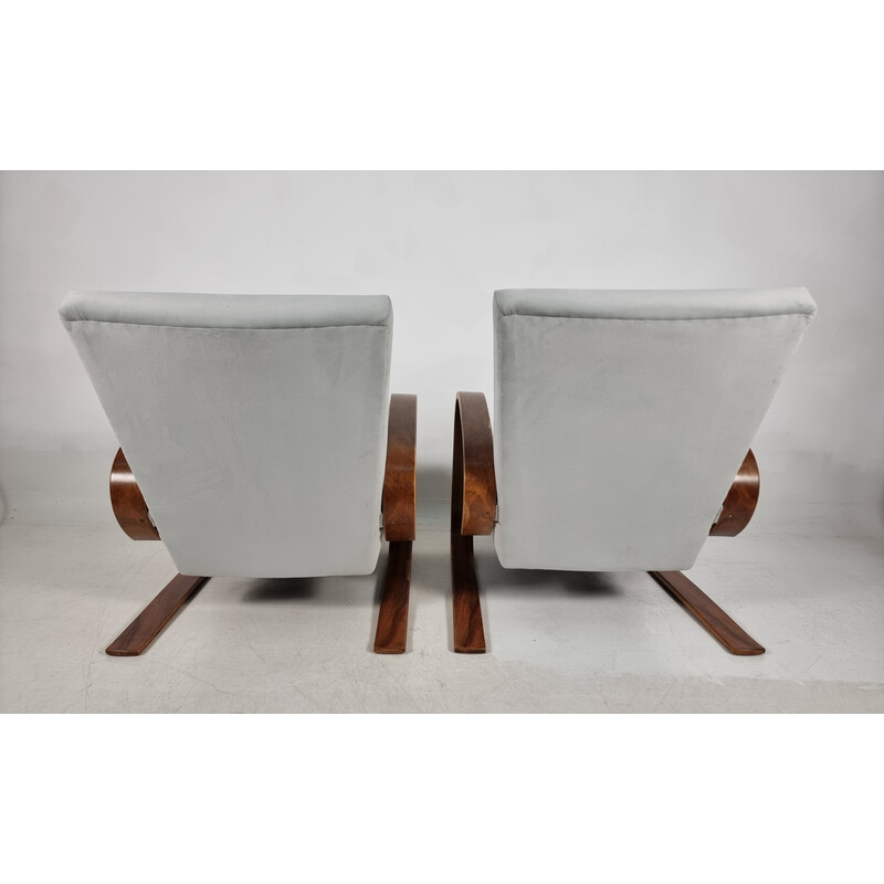 Pair of vintage armchairs in walnut by Miroslav Navratil for Up Zavody, 1940s