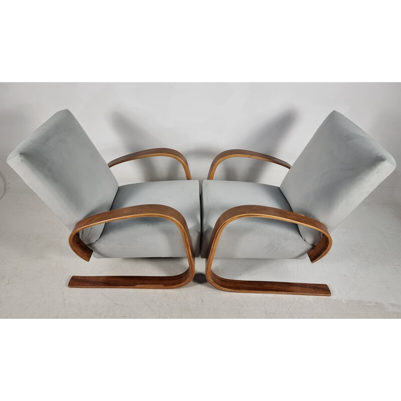 Pair of vintage armchairs in walnut by Miroslav Navratil for Up Zavody, 1940s