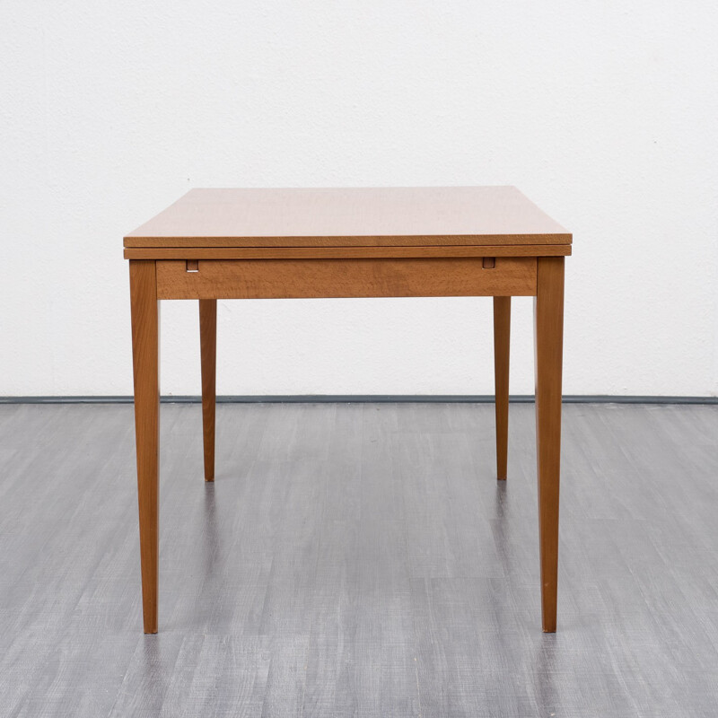 Extendible dining table in walnut veneer - 1960s 