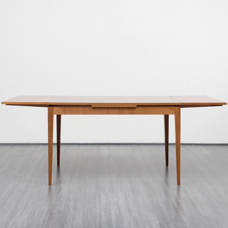 Extendible dining table in walnut veneer - 1960s 