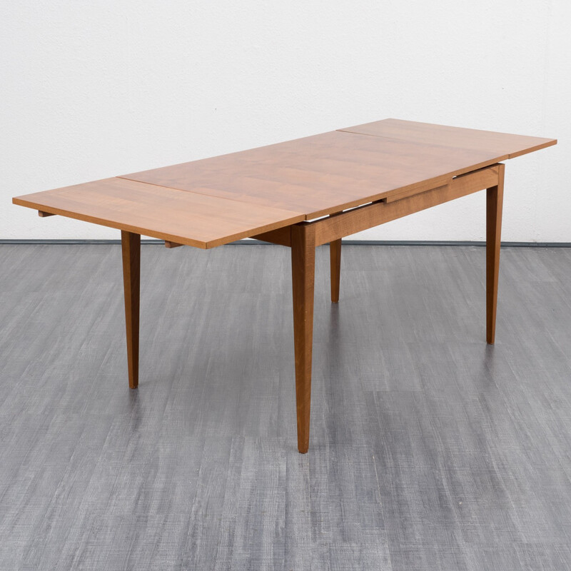 Extendible dining table in walnut veneer - 1960s 