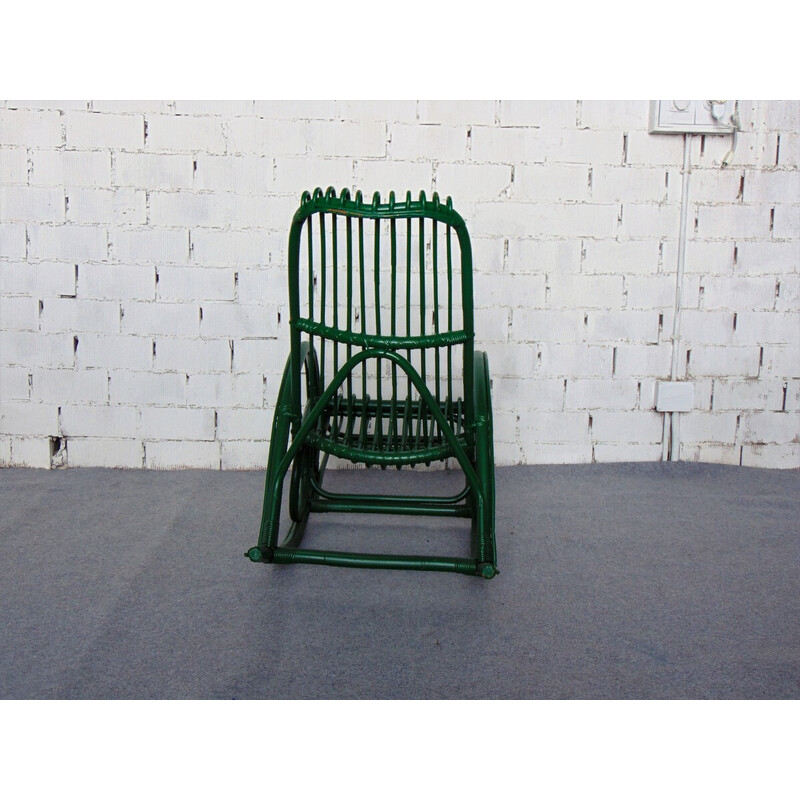 Vintage green bamboo rocking chair with distinctive shapes