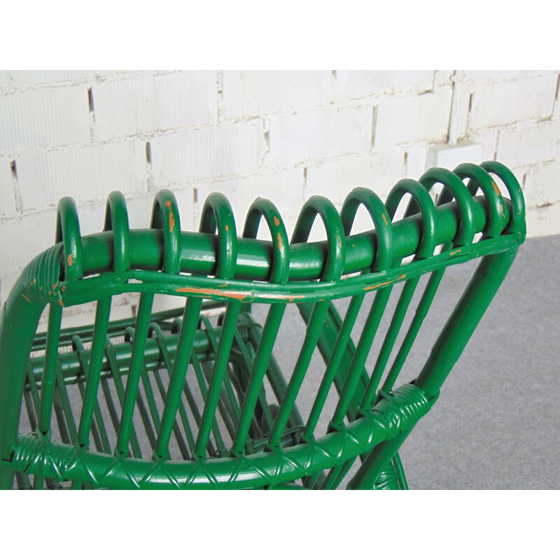 Vintage green bamboo rocking chair with distinctive shapes