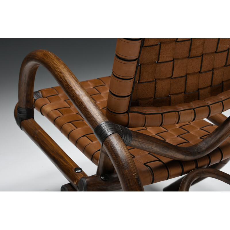 Rustic vintage armchair in woven leather and bamboo, 1950