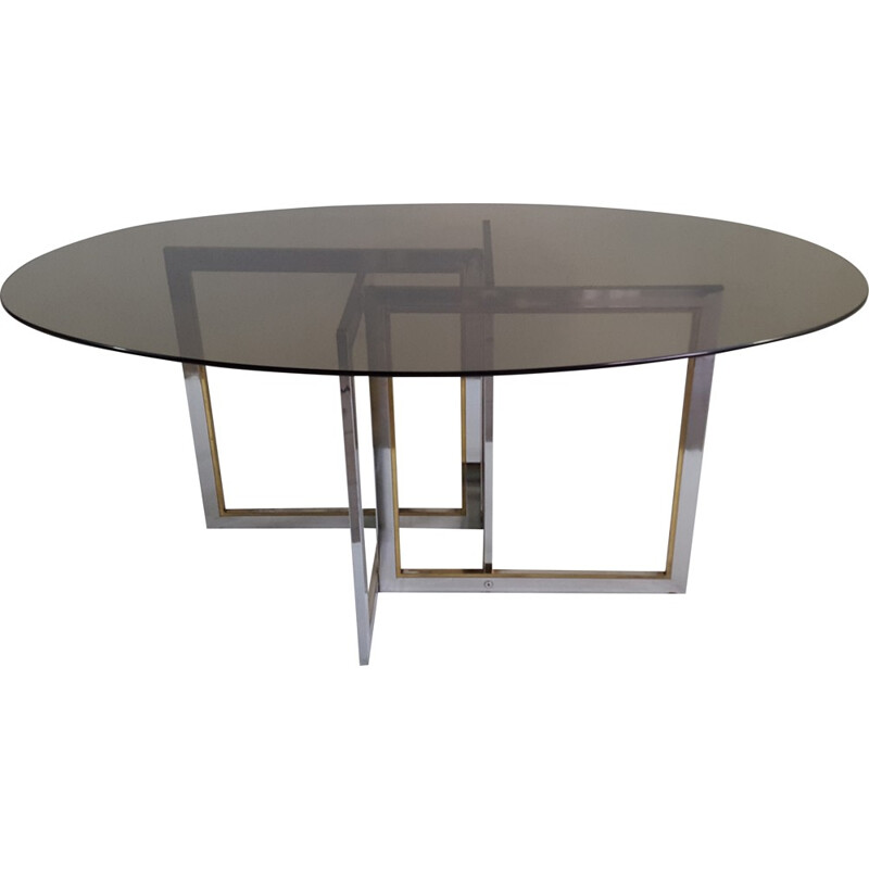 Oval dining table with asymmetrical feet - 1970s