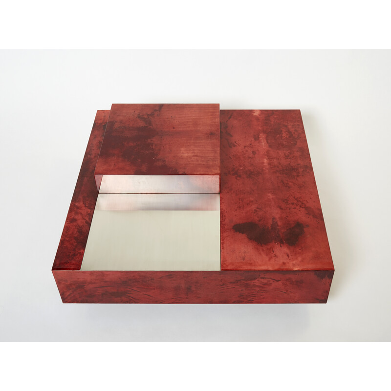 Vintage red parchment and steel coffee table with bar by Aldo Tura, Italy 1960