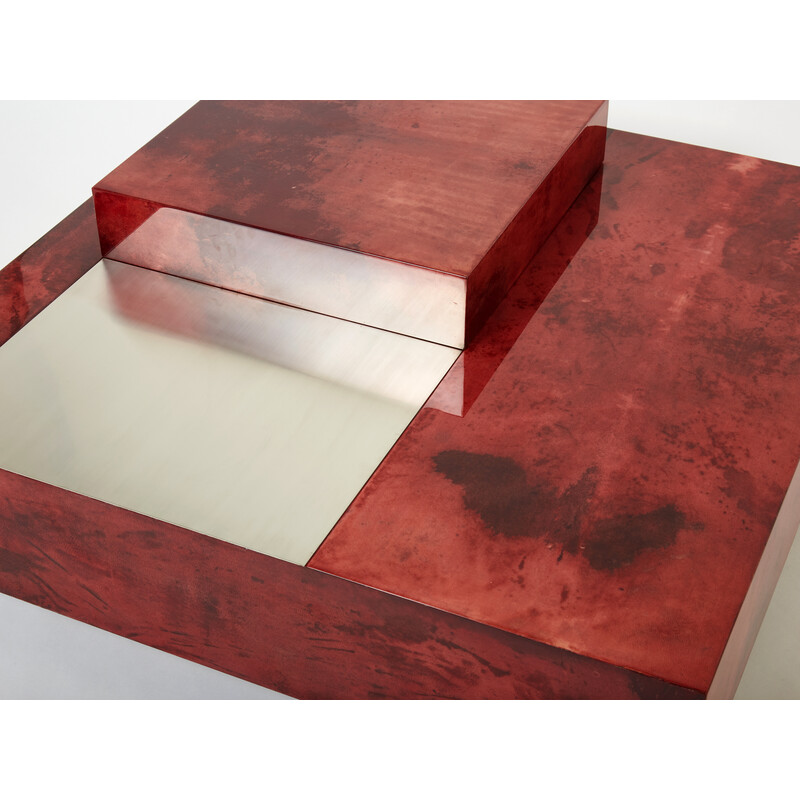 Mesa de centro vintage de pergamino rojo y acero con barra de Aldo Tura, Italia 1960