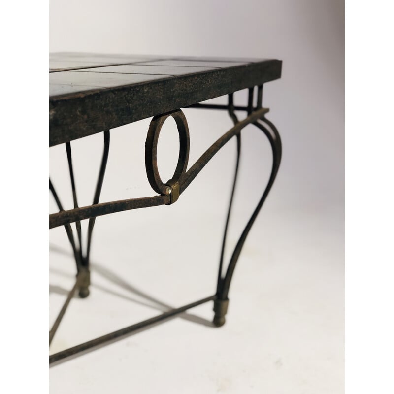 Vintage coffee table with wrought iron base and ceramic top