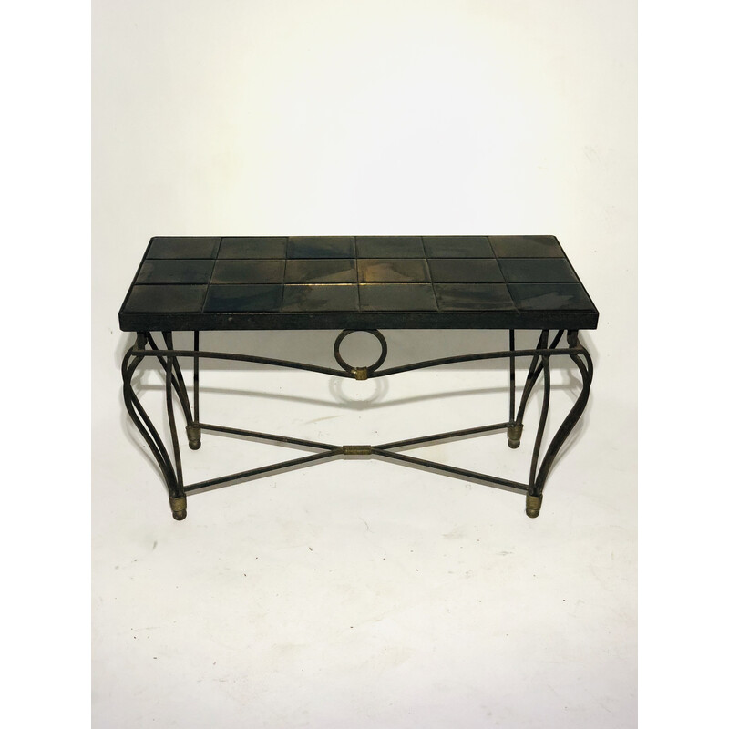 Table basse vintage avec piètement en fer forgé et plateau en céramique