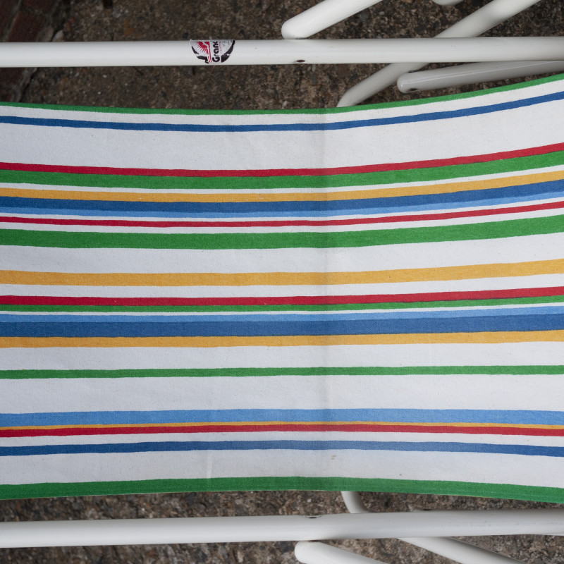 Vintage Italian tubular metal and striped fabric deckchair by Grand Soleil, 1980-1989