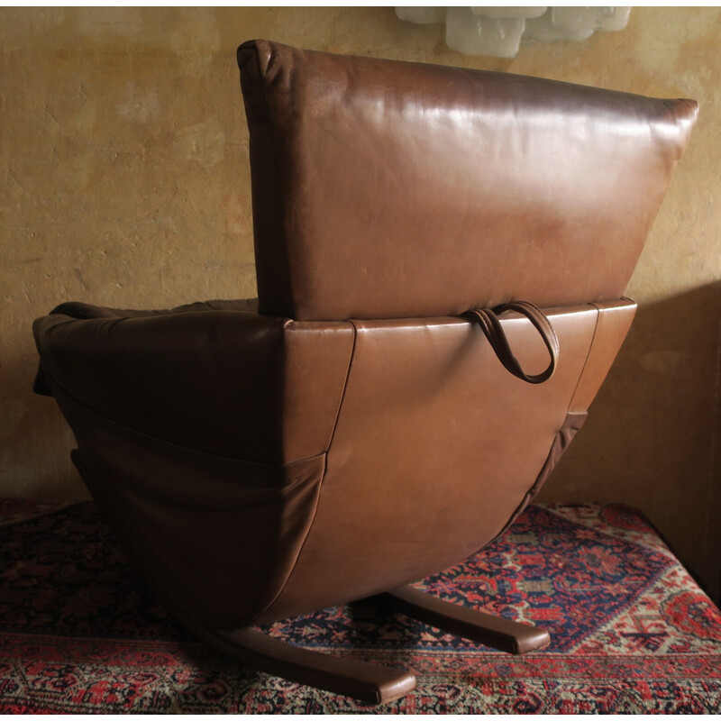 Fauteuil à bascule vintage en cuir patiné par De Sede, Suisse 1970