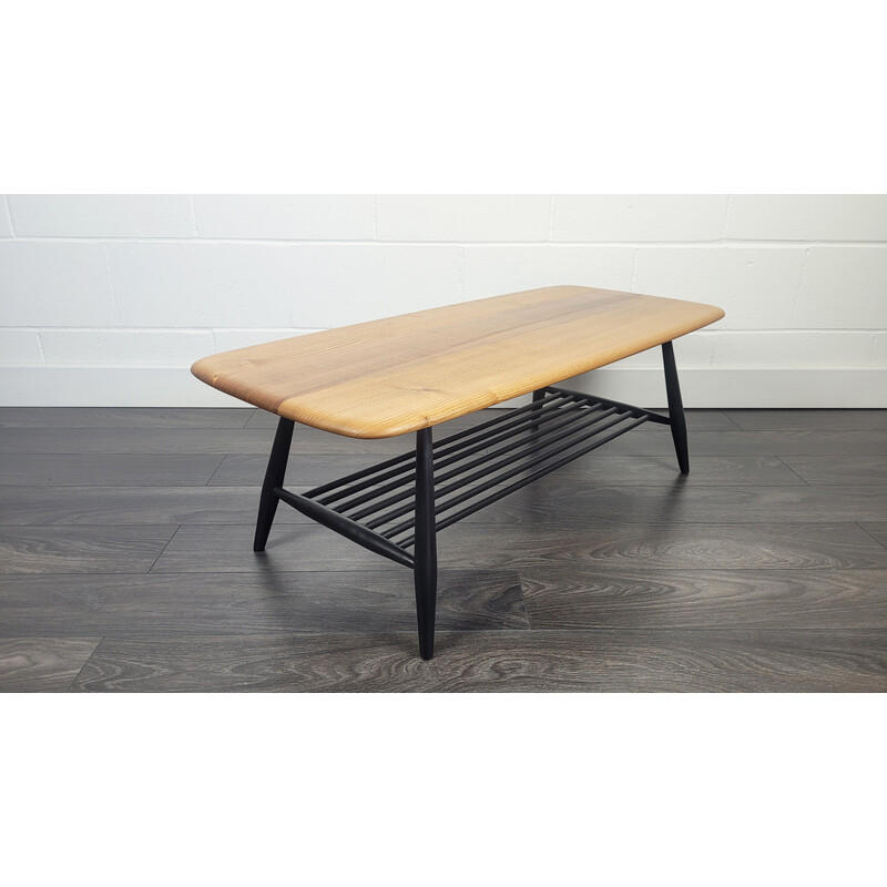 Mesa de centro vintage de madera de olmo con patas negras de Ercol, años 70