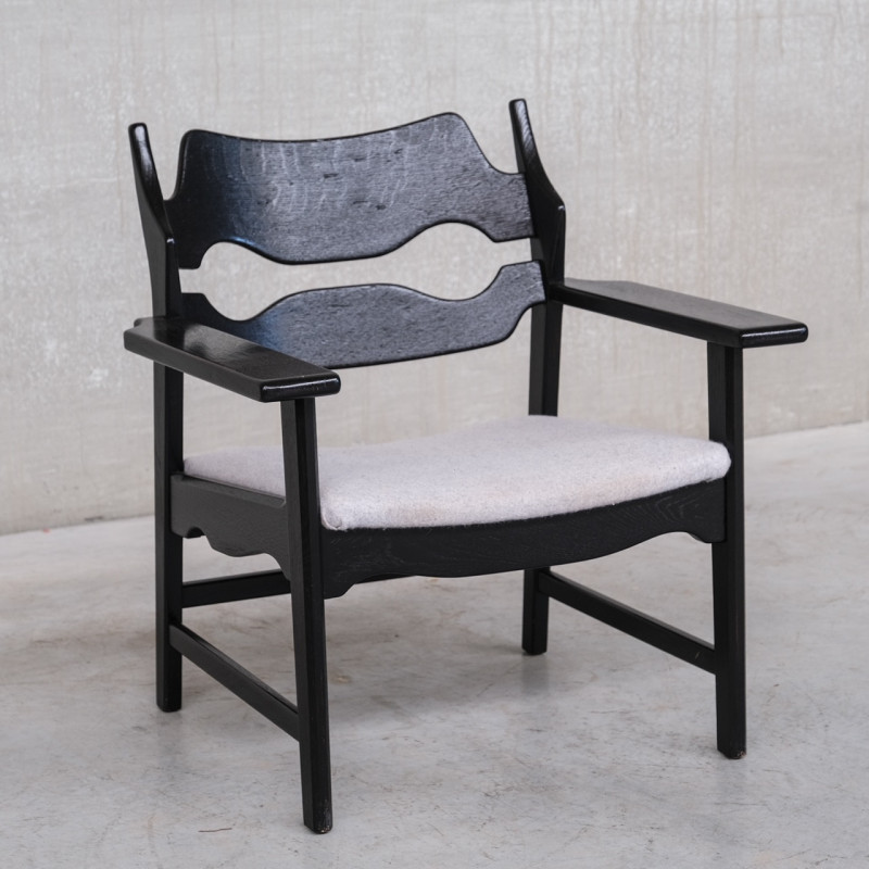 Mid-century Danish oakwood Razor armchair by Henning Kjaernulf, 1960s