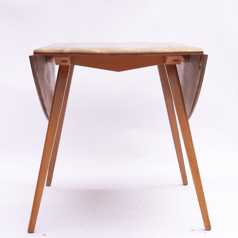 Mesa redonda vintage en madera de haya y olmo de Ercol, Reino Unido 1960